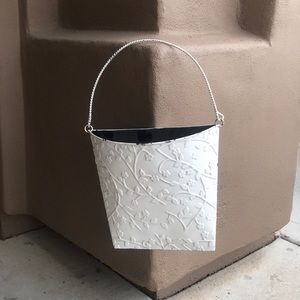 White hanging flower or magazine box